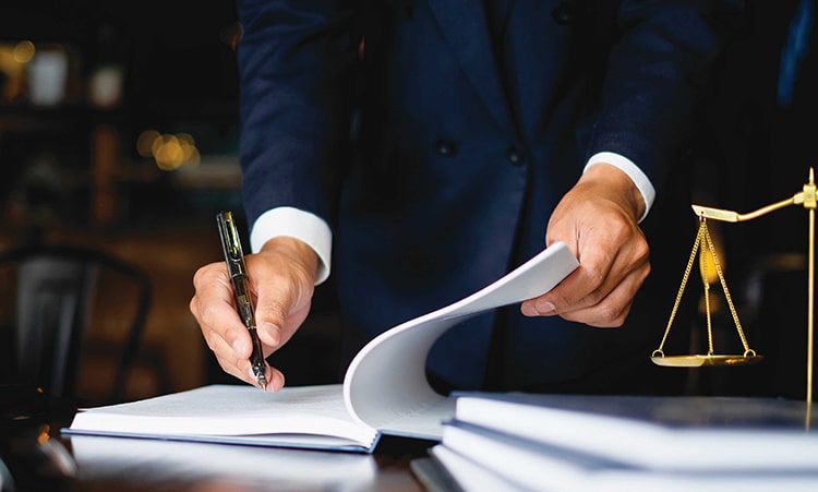 Close Up Lawyer Businessman Working Or Reading Lawbook In Office Workplace For Consultant Lawyer Concept.