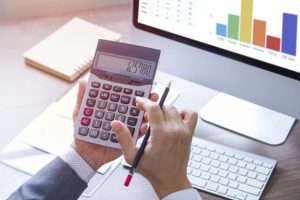 Reviewing A Financial Report In Returning On Investment Analysis